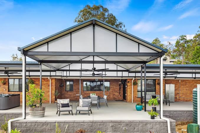 Steel Gable Patio Over Brick Home